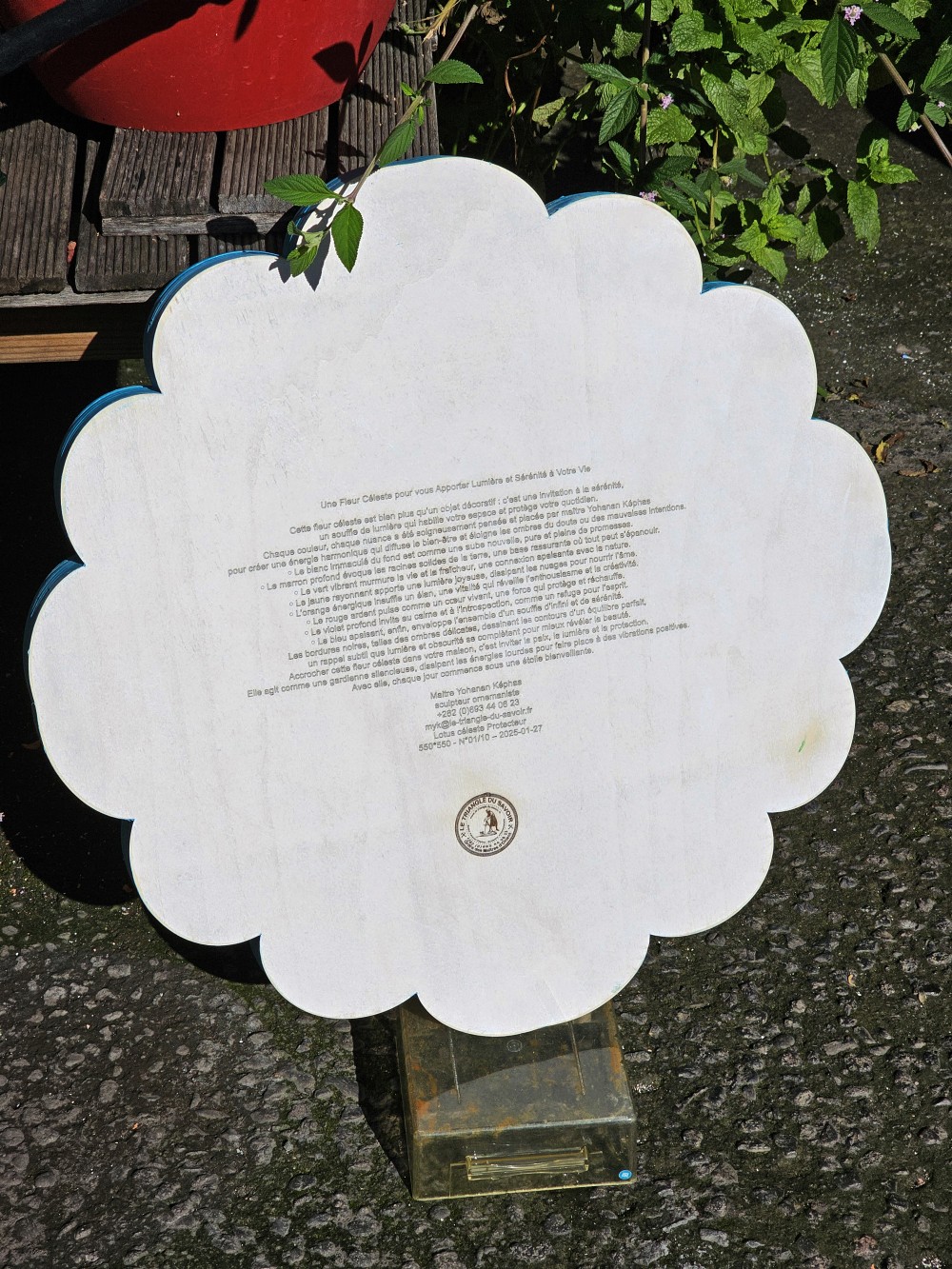 Dos d’un mandala avec texte explicatif et identification de l’œuvre